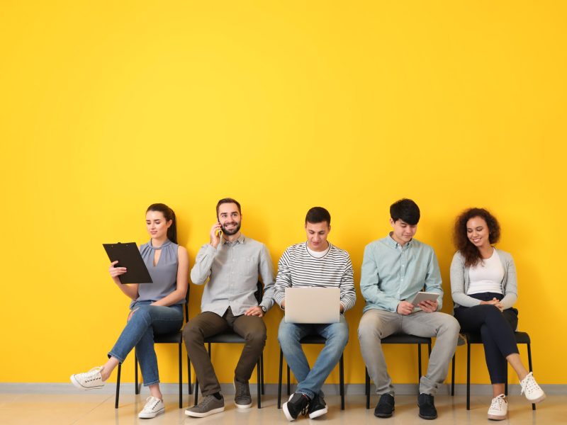 Young people waiting for job interview indoors