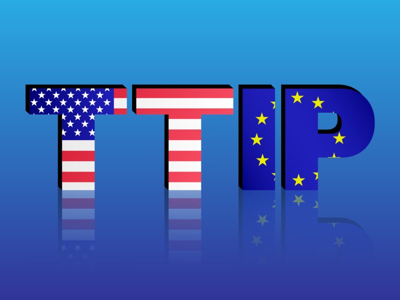 TTIP - Transatlantic Trade and Investment Partnership. United States of America and European Union flags in TTIP text with shadow.