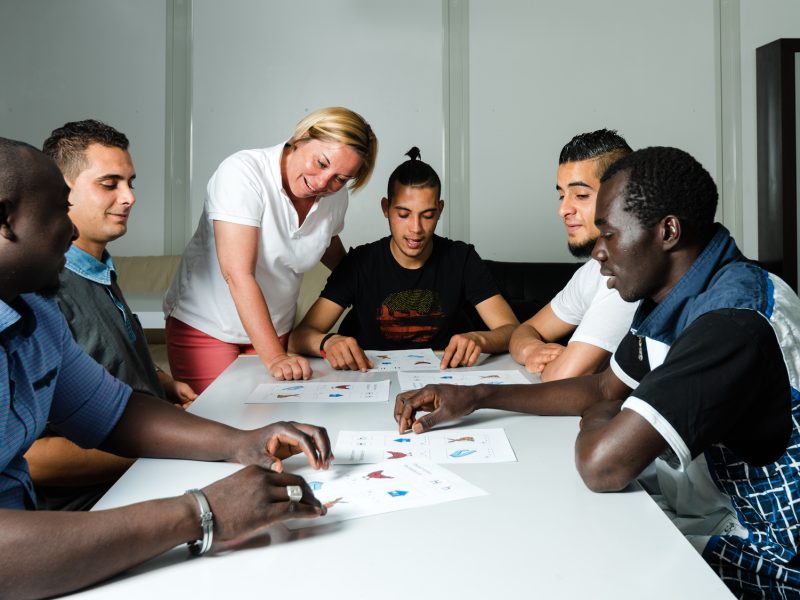 Language training for refugees in a German camp