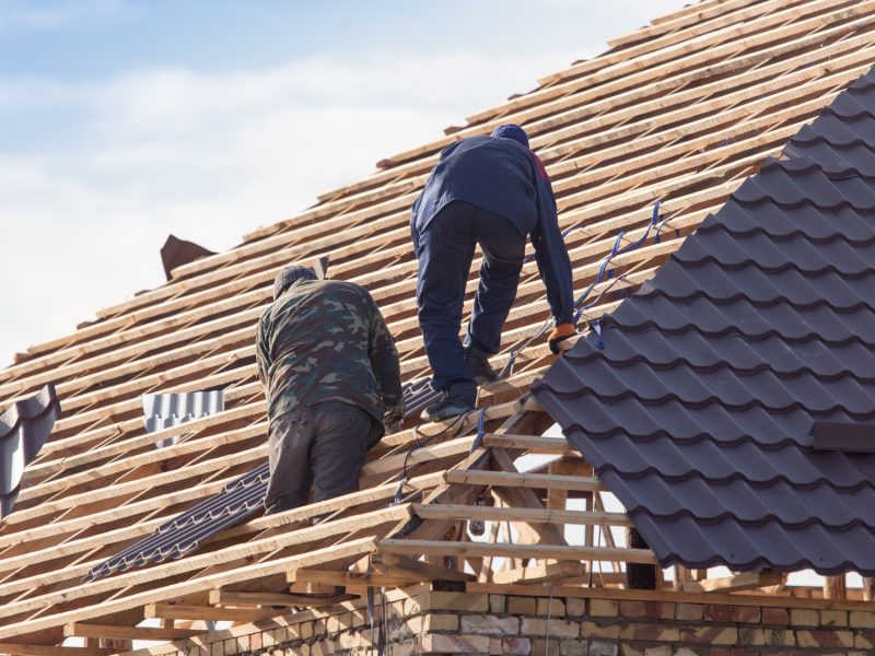 workers working on the roof