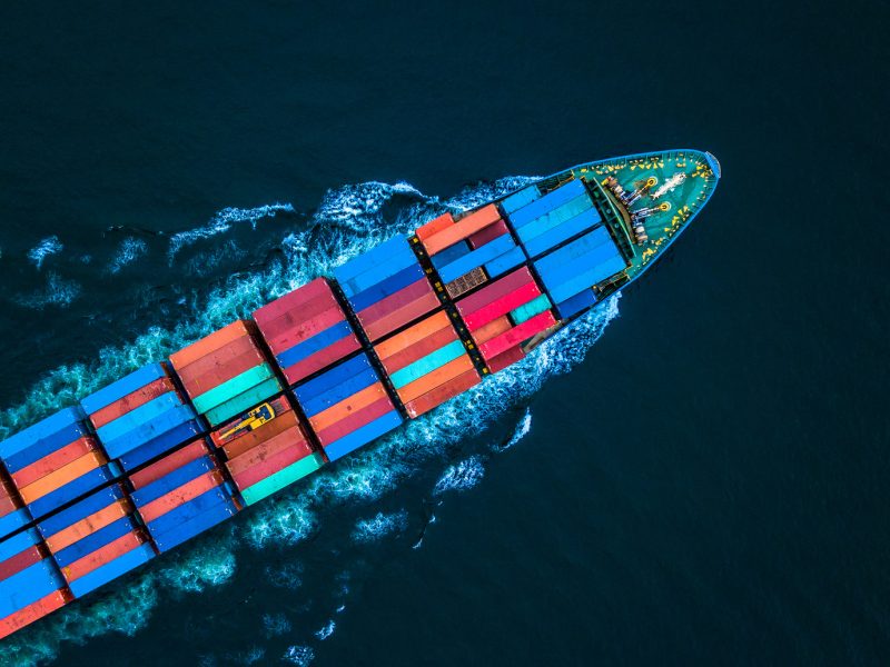 Aerial view from drone, container ship or cargo ship in import export and business logistic.