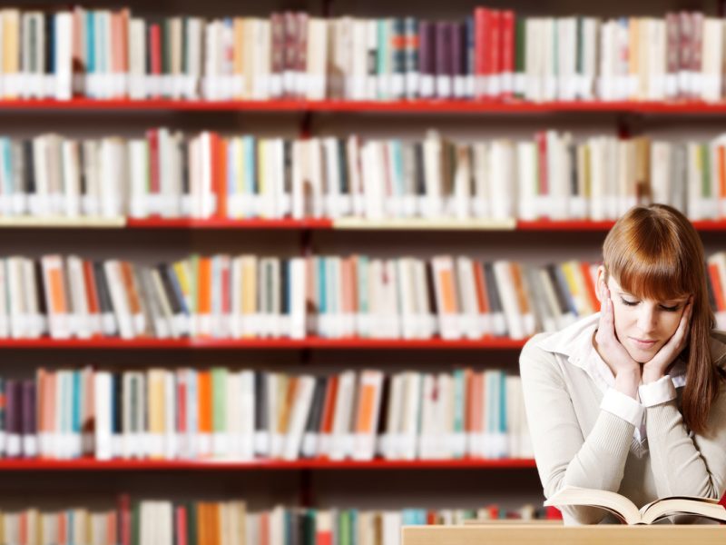 Young student in a library