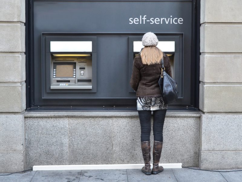 Girl at ATM