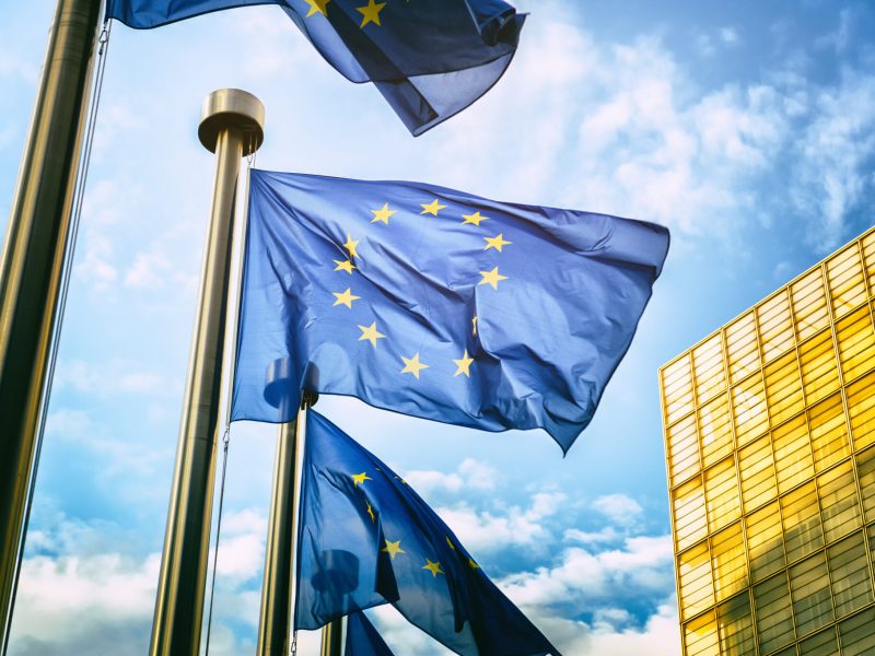 EU flags in front of European Commission in Brussels