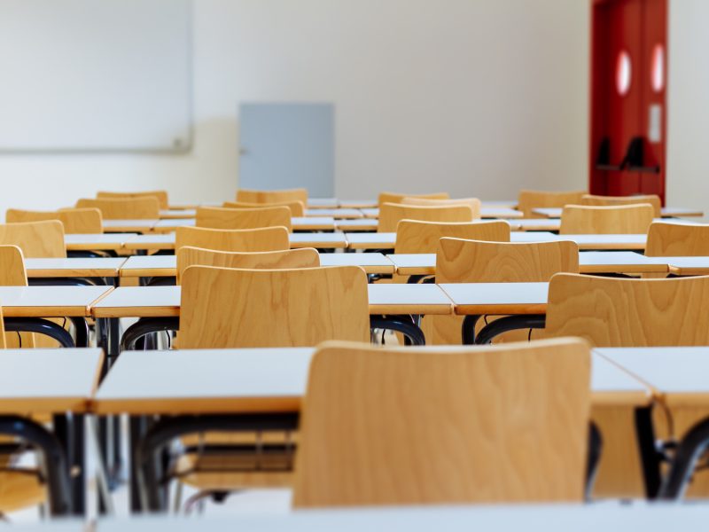 Desk and chairs in classroom