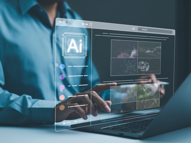 AI image creation technology. Man use AI software on a laptop to generate images, showcasing a futuristic user interface. screen with visual prompt. Image generated by artificial intelligence. photo,