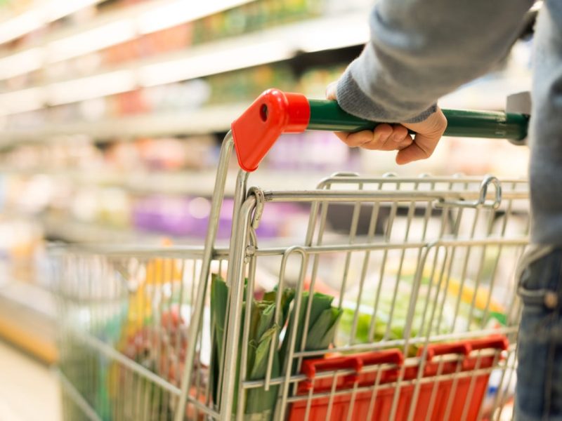 Close-up detail of a man shopping in a supermarket